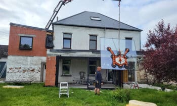 Wereldprimeur: hybride laadkraan van 48 ton op vrachtwagen 11